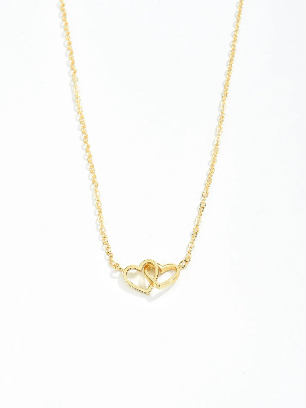 Double Hollow Heart Chain Necklace showcasing a beautiful double hollow heart design in gold.